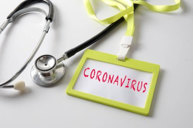 Tıbbi Konsept: Stetoskop ve Kimlik etiketi Coronav