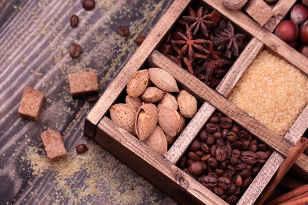 Coffee and spices in a wooden printers box. — Stock Photo, Image