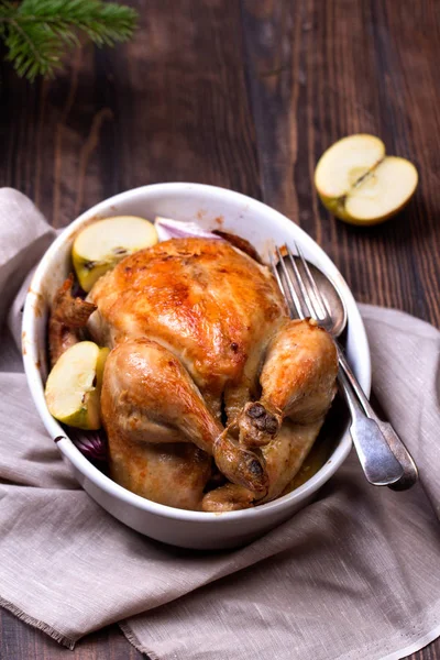 Roasted chicken on wooden table, top view — Stock Photo, Image