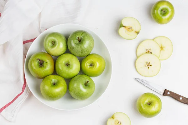 Apple on white table — Stock Photo, Image