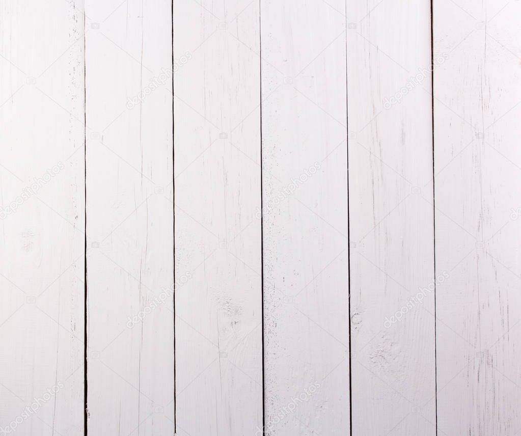 White painted wood texture as background.