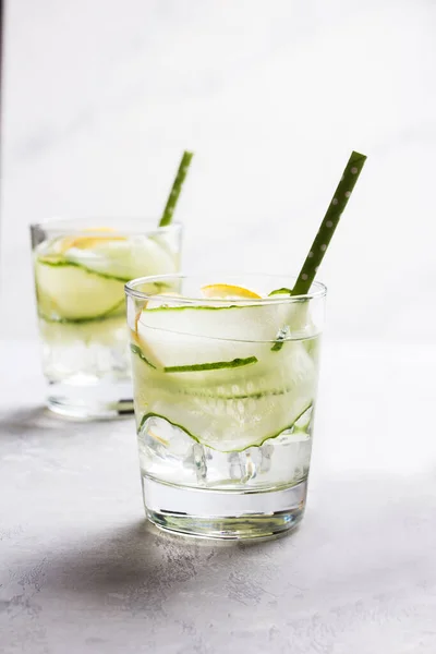 Nutritious detox water with lemon and cucumber in a glass. — Stock Photo, Image