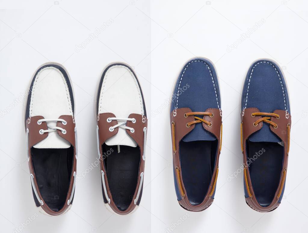 Group of pairs of shoes, moccasins, isolated. Men`s leather loafers moccasins isolated on white background.