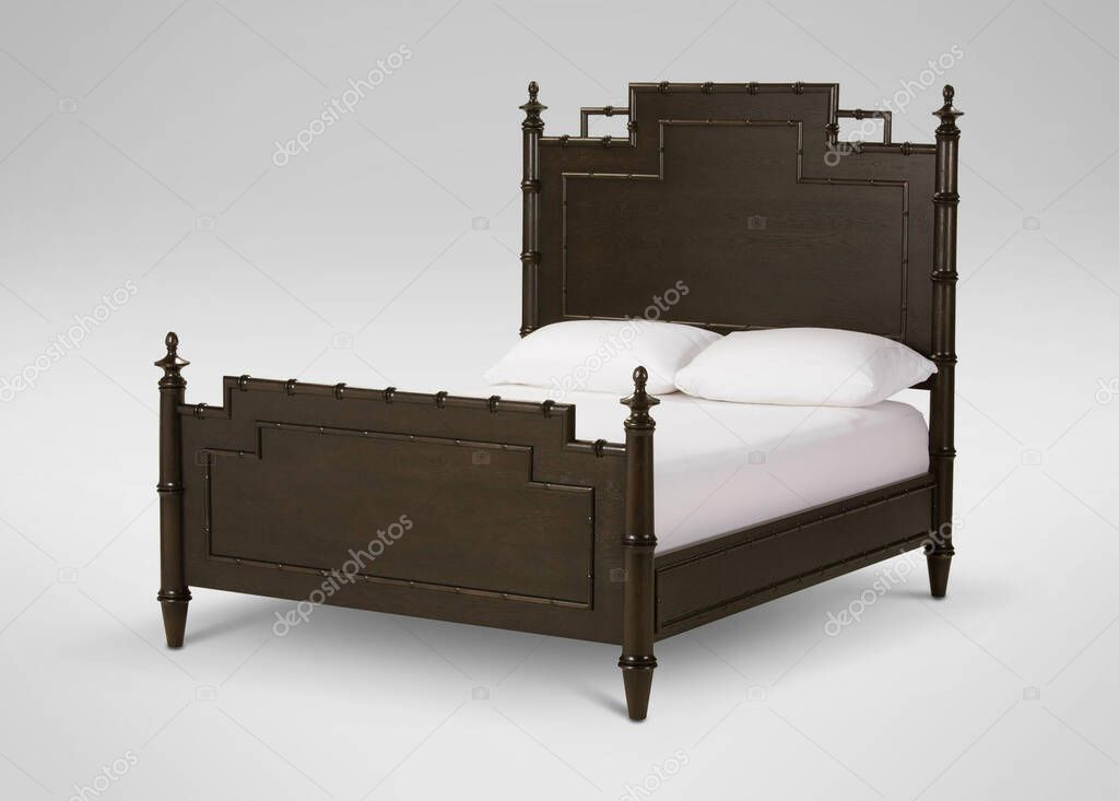 King Size wooden Bed with white linen, isolated. Wooden bed isolated on white background.