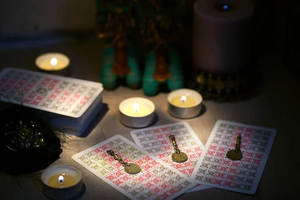 Defocused tarot card mystic ritual.Fortune-telling