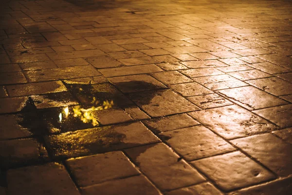 Pavement with puddle — Stock Photo, Image