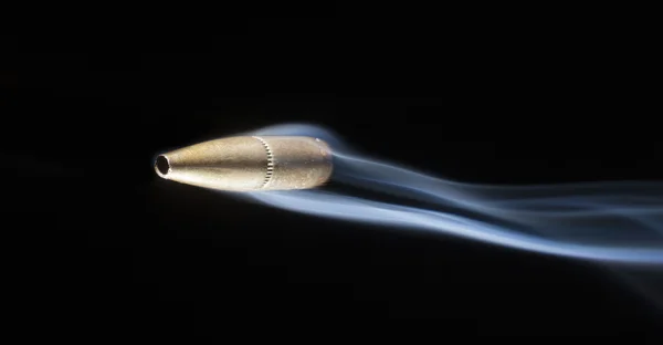 Fast bullet with smoke — Stock Photo, Image