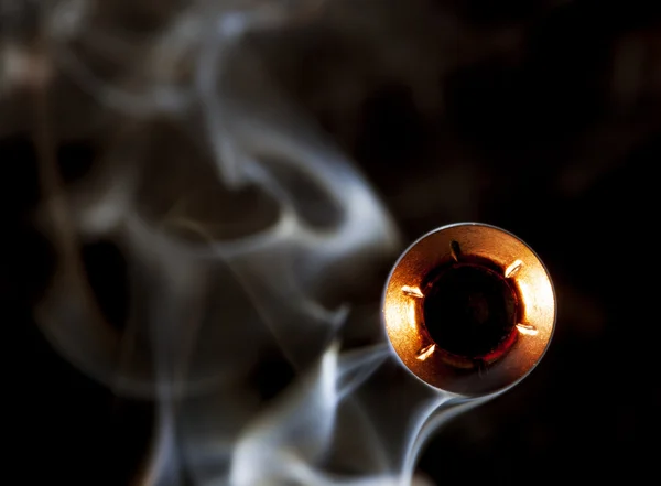 Bullet and smoke close — Stock Photo, Image