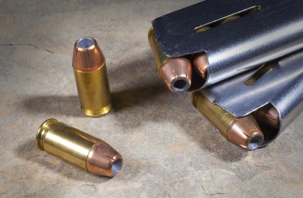 Handgun cartridges and magazines