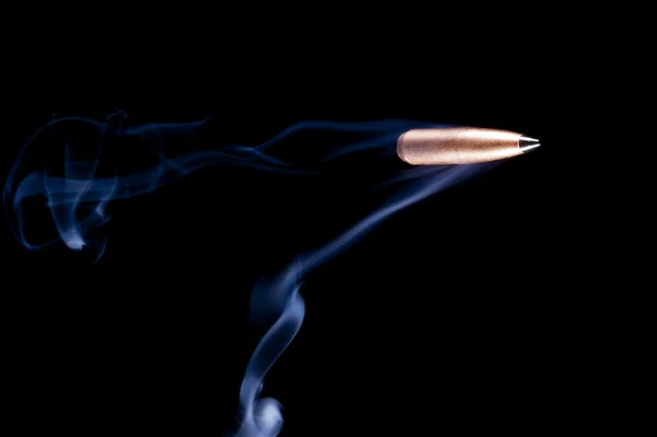 High speed bullet and smoke — Stock Photo, Image