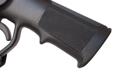 Bir silah üzerinde tabanca tutuş