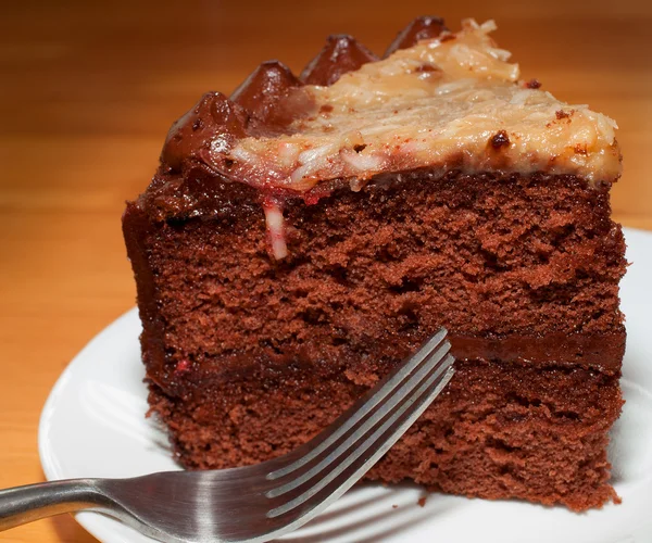 Fork next to chocolate cake — Stock Photo, Image