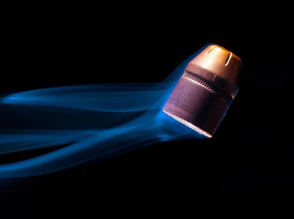 Tumbling handgun bullet — Stock Photo, Image