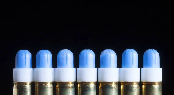 Cartridges with blue dye for bullets — 图库照片