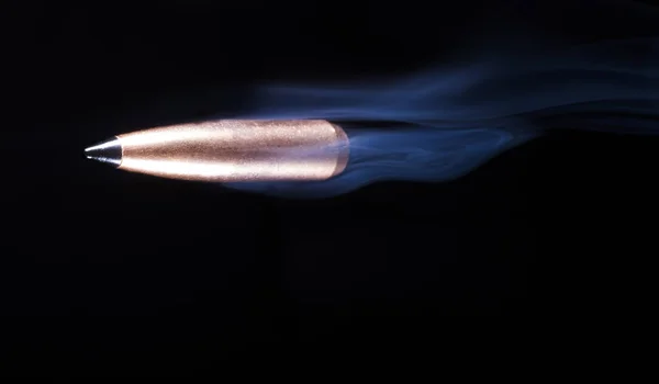 Polymer tipped bullet and smoke — Stock Photo, Image