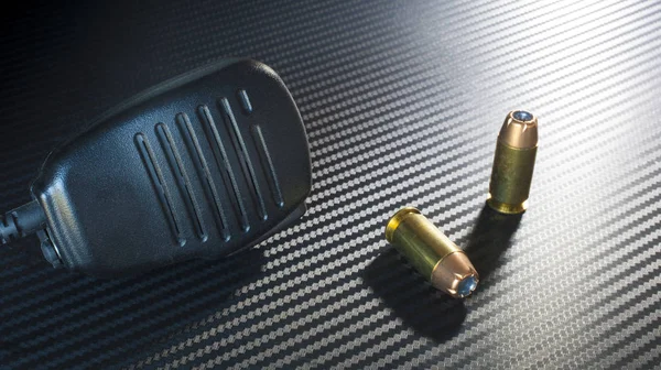 Mike and pistol cartridges — Stock Photo, Image