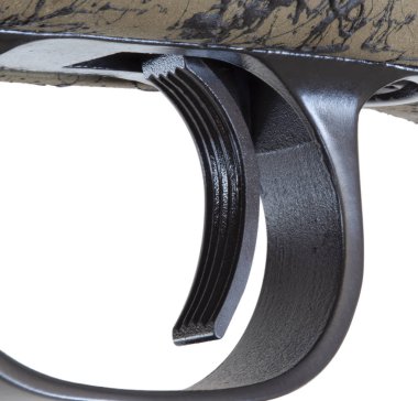 Sürgülü bir tüfekte tetikleyici ayakkabı.