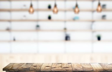 Beyaz ahşap üst tablo kafe iç arka plan bulanık. Fo