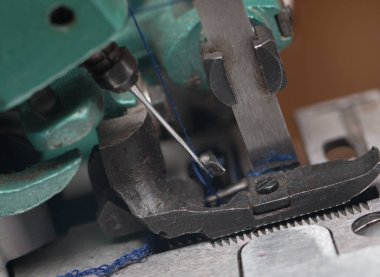 Dikiş makinesinin bir parçası