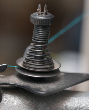 Dikiş makinesinin bir parçası