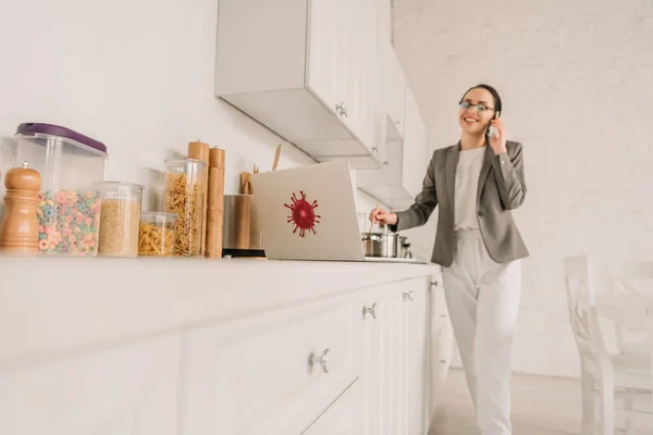 Selective Focus Businesswoman Blazer Pajamas Cooking Talking Smartphone Kitchen Laptop — Stock Photo, Image
