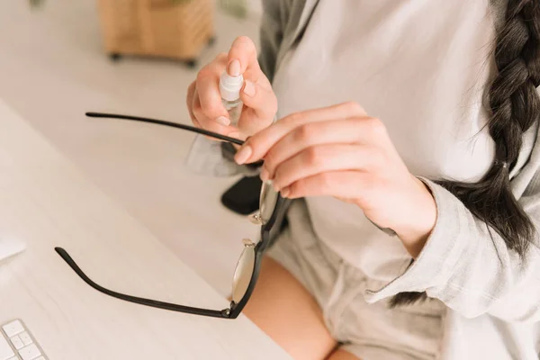 Cropped View Freelancer Spraying Sanitizer Eyeglasses — Stock Photo, Image