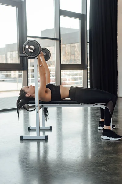 Sportswoman Lying Sport Equipment Training Barbell Gym — Stock Photo, Image