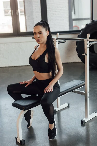 Sexy Sportswoman Sitting Sport Equipment Looking Camera Gym — Stock Photo, Image