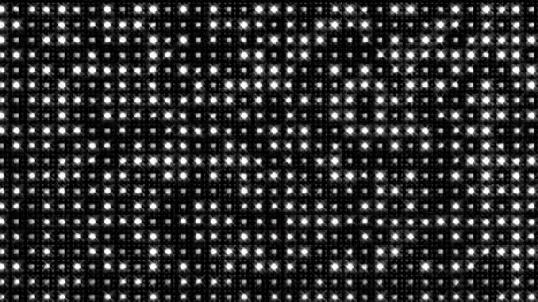 Belle vidéo abstraite qui brille, lumière vive qui arrange des mouvements colorés subtils avec des points, fond noir