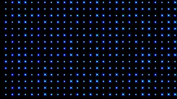 Belle vidéo abstraite qui brille avec des points, lumière vive qui régule les mouvements colorés, fond noir 