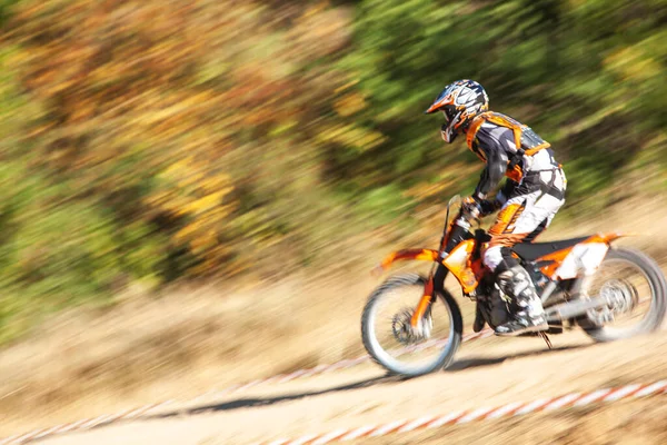 The motorcyclist is landing. Motocross. Sports. A moving blur draw background
