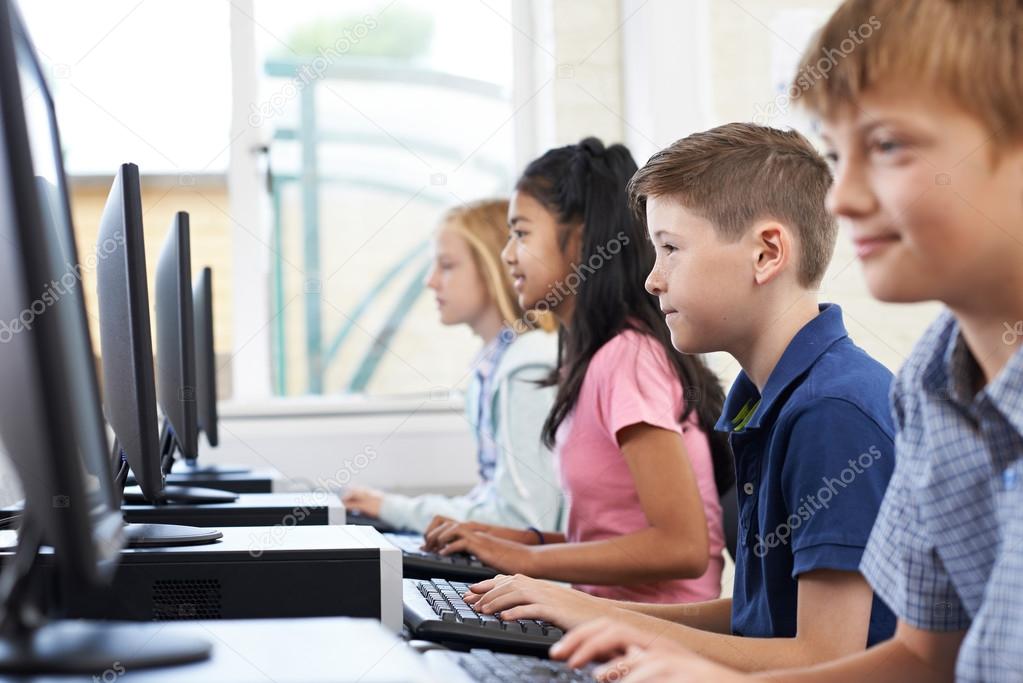 Male Elementary Pupil In Computer Class 