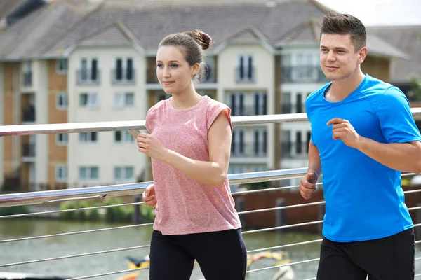 Young Couple Exercising In Urban Environment — Stock Photo, Image