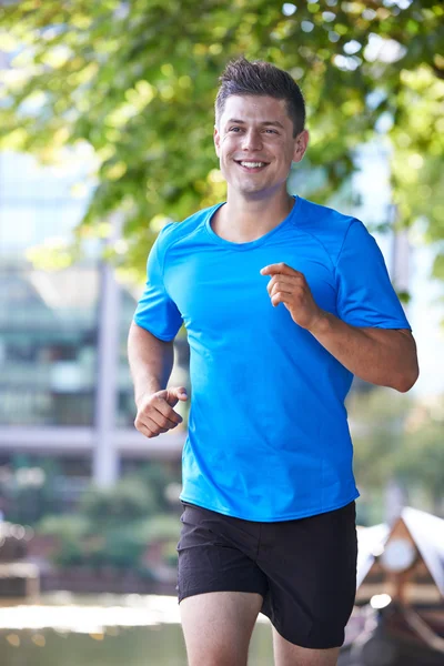 Young Man Running In Urban Setting — Stock Photo, Image