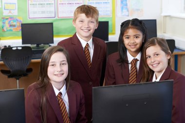 Portrait Of Elementary School Pupils In Computer Class clipart
