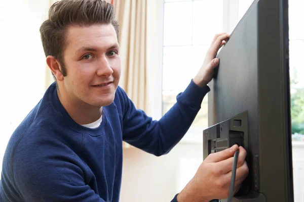 Television Engineer Installing New Television At Home — Stock Photo, Image