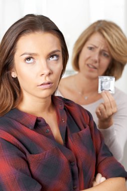 Mother Talking To Teenage Daughter About Contraception clipart