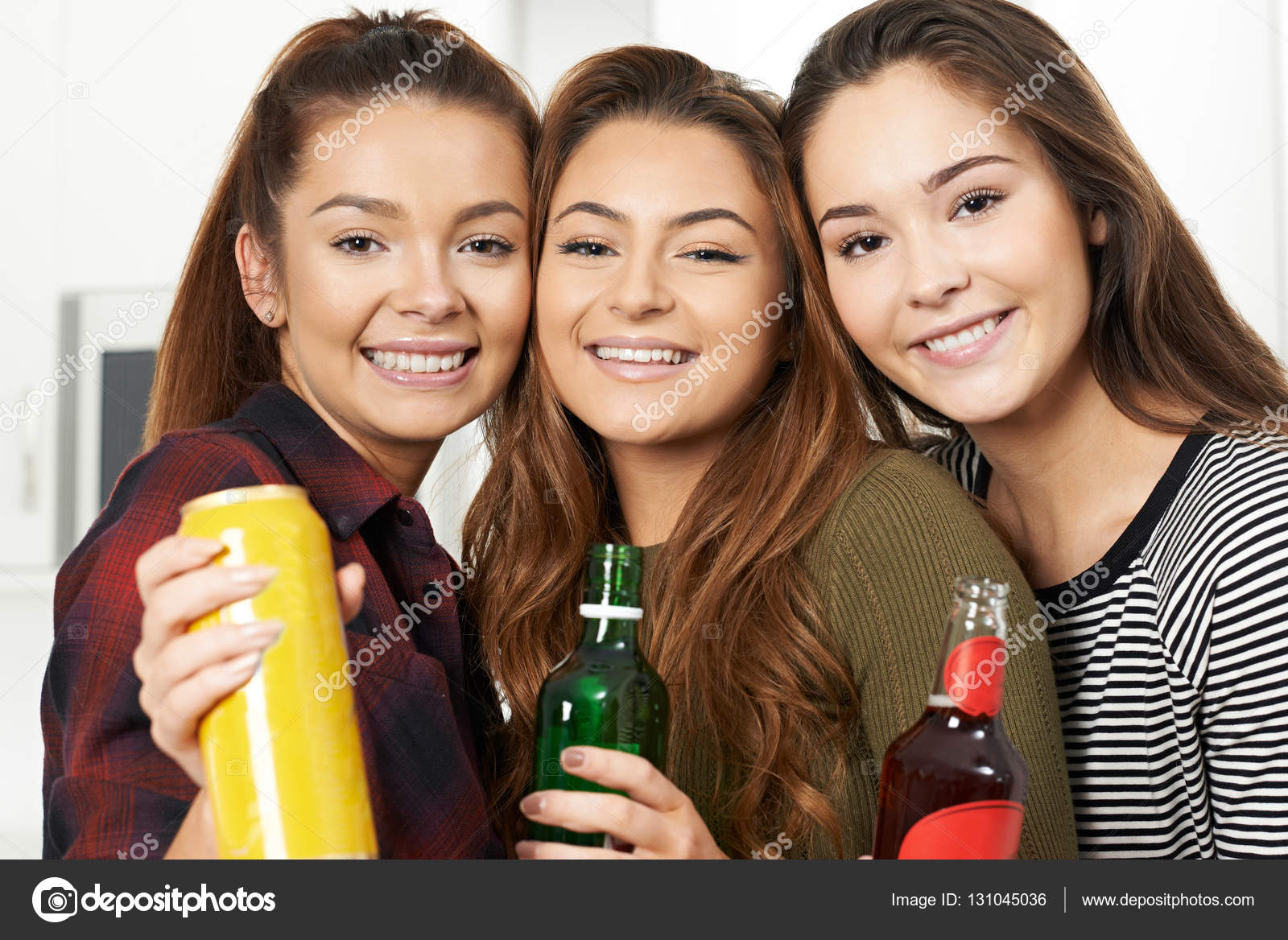 Group Of Teenage Girls Drinking Alcohol At Party — Stock Photo © HighwayStarz 131045036
