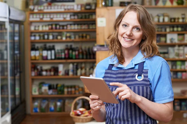 Portrait Of Delicatessen Owner With Digital Tablet — Stock Photo, Image