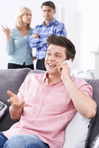 Unhappy Mature Parents With Adult Son Living At Home — Stock Photo, Image