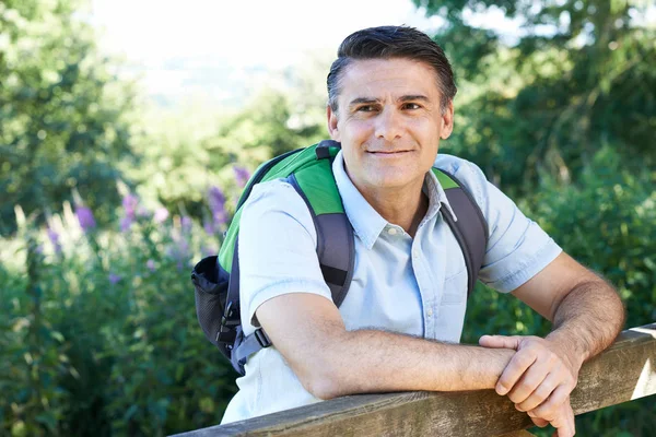 Mature Man Hiking In Countryside — Stock Photo, Image