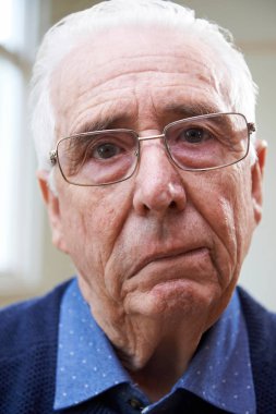 Portrait Of Senior Man Suffering From Stroke clipart