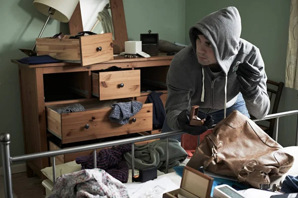 Burglar Stealing Items From Bedroom During Hose Break In — Stock Photo, Image
