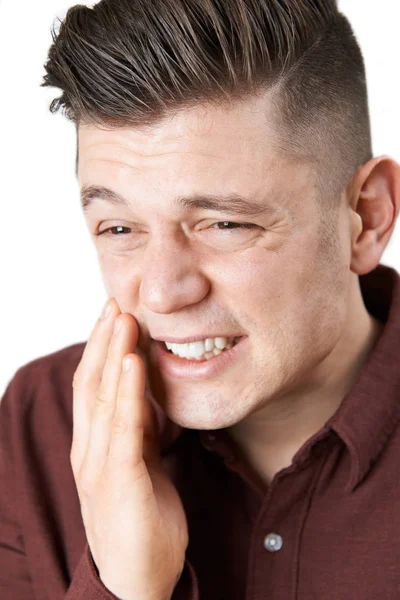 Studio Shot Of Young Man Suffering With Toothache — Stock Photo, Image