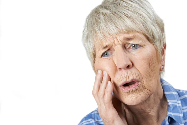 Studio Portrait Of Senior Woman Suffering With Toothache — Stock Photo, Image