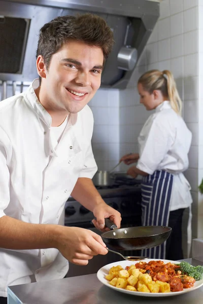 Portrait Of Chef Working In Restaurant Kitchen — Stock Photo, Image