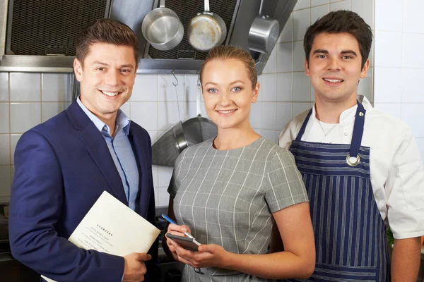 Portrait Of Restaurant Team Standing In Kitchen — Stock Photo, Image