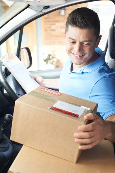 Courier In Van Delivering Package To Domestic House — Stock Photo, Image