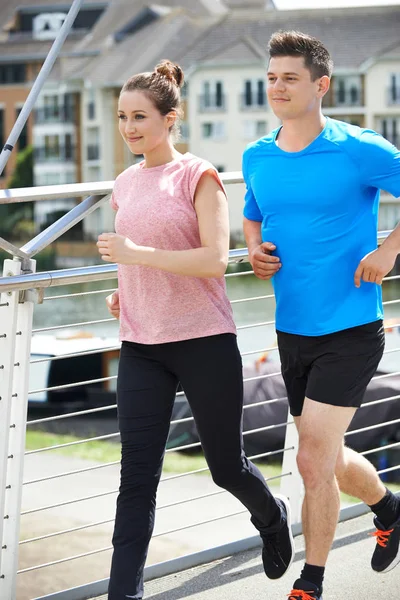 Young Couple Exercising In Urban Environment — Stock Photo, Image