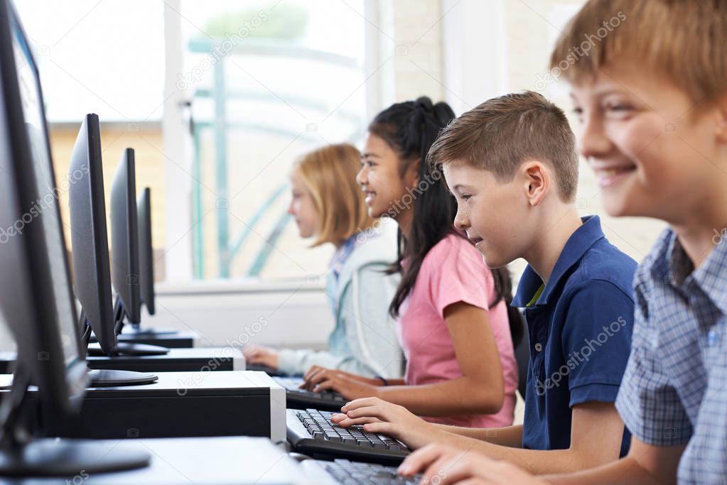 Male Elementary Pupil In Computer Class 